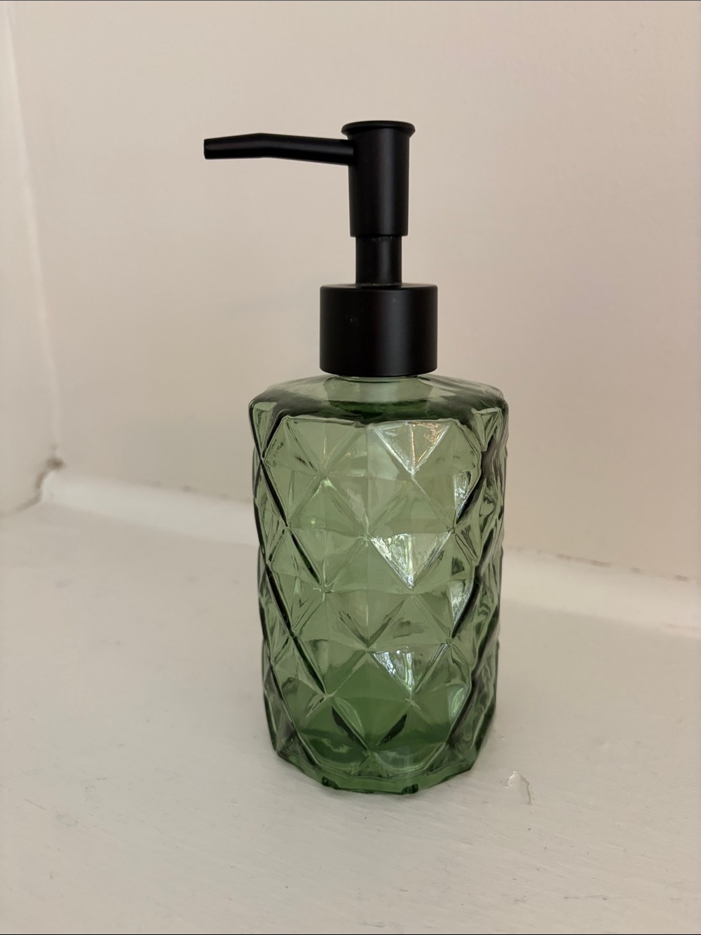 Green glass soap dispenser